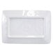 A white rectangular plate with a navy blue Van Gogh design on it.