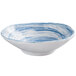a close up of a blue and white surface