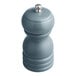 A close-up of an Acopa steel blue wooden salt/pepper mill with a silver top.