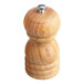 A close-up of an Acopa wooden pepper mill with a round metal top.