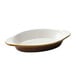 A white and brown Tuxton oval dish with a rim.