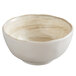 A white melamine bowl with brown speckled edges.