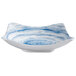 A white square melamine bowl with a blue swirl design.