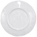 A white round melamine plate with a wavy navy rim.