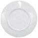 A white plate with a round rim.