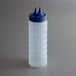 a plastic water bottle with a blue lid