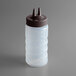 A Vollrath clear plastic Twin Tip squeeze bottle with a brown cap.