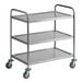 A stainless steel three-shelf utility cart with wheels.