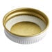 A white and gold Libbey replacement growler cap.