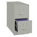 A gray Hirsh Industries two-drawer vertical letter file cabinet with one drawer open and files in it.