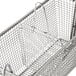 A metal FMP fryer basket divider.