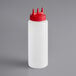 A white plastic Vollrath Tri Tip squeeze bottle with a red cap.