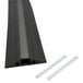 A black plastic D-Line floor cable cover with two black plastic strips.