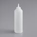 a white plastic bottle with a pointy tip