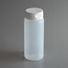 A clear plastic Vollrath squeeze bottle with a white Flowcut cap.