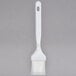 A white Carlisle Sparta Spectrum pastry brush with a black handle.