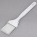 a white brush on a gray background
