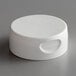 A white round Vollrath Flowcut replacement cap with a hole.