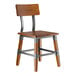 A wooden chair with a rustic walnut finish, metal accents, and a solid backrest.