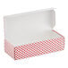 A white and red Valentine's Day heart candy box with the lid open.