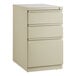 A white Hirsh Industries mobile pedestal file cabinet with 2 box drawers and 1 file drawer.