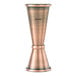 An antique copper Japanese style jigger with metal cups.