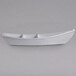 A white G.E.T. Enterprises marble white granite resin-coated aluminum boat with dividers.