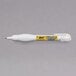 A Bic Wite-Out Shake 'n Squeeze correction pen with a yellow label and tip.