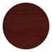 A round, standard height table top with a cherry wood finish.