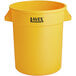 A yellow plastic trash can with black text reading "Lavex" and a handle.