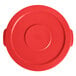 A red plastic lid for a Lavex 10 gallon round trash can.