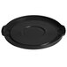 A black round plastic lid with a circle in the middle.