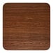 A square, reversible walnut and oak table top with rounded corners.