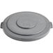A Lavex gray plastic lid for a commercial trash can with a circular hole.