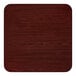 A square, reversible table top with a cherry wood finish, designed for standard height tables and paired with a 22-inch cast iron base.