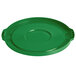 A green plastic lid with a circle handle.