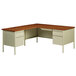 A Hirsh Industries left corner pedestal desk in putty oak with two drawers.