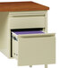 A Hirsh Industries left corner pedestal desk with a file cabinet open to reveal two drawers and a file drawer.