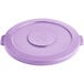 A purple plastic lid for a round Lavex commercial trash can.