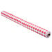 A roll of red and white checkered vinyl table cover with flannel back.