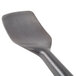 A close-up of a black Zeroll TubMate Ice Cream Spade.