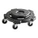 A black plastic dolly with wheels attached underneath a black circular container.