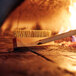 A Chef Master pizza oven brush with a handle.