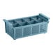 A blue plastic Noble Products flatware rack with compartments and holes.