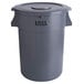 A gray plastic Lavex trash can and lid.