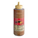 A brown bottle of Torani Salted Chocolate Caramel Flavoring Sauce with a yellow cap.