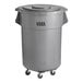 A Lavex grey plastic trash can with wheels.