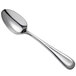 a silver spoon on a white background