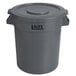 A gray plastic Lavex trash can with a lid.