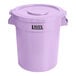 A purple Lavex round commercial trash can with a lid.